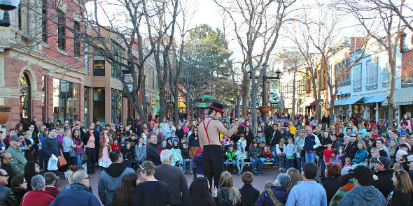 Street performers, an essential part of Pearl Street Mall’s atmosphere, draw impromptu audiences. Photo: Downtown Boulder DBI.org