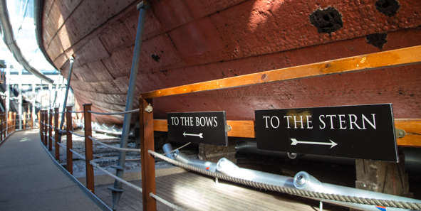 The SS Great Britain’s bulging hull secured in its climate-controlled dry dock. (Photo: Chris Allsop)