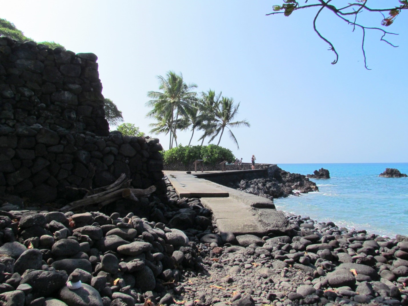 Temple walls tower above the rocky shore of Kealakekua Bay. (Photo: Debra Smith)