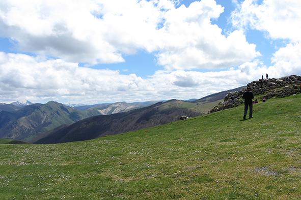 Pilgrims approach a mountain shrine (Photo: Alice Selwyn Brace)