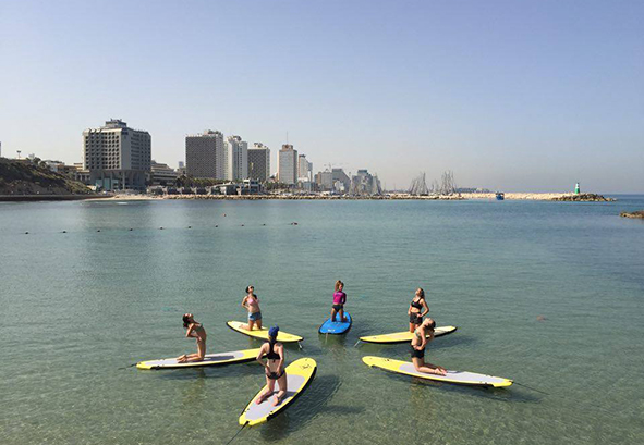 SUP Yoga at Hilton Beach (Photo: Guy Bachar)