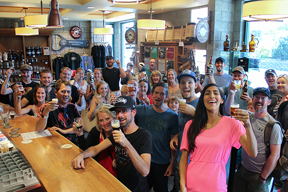 “Cheers!” from happy tour-goers in Deschutes Brewery and Pub (Photo: Deschutes Brewery)