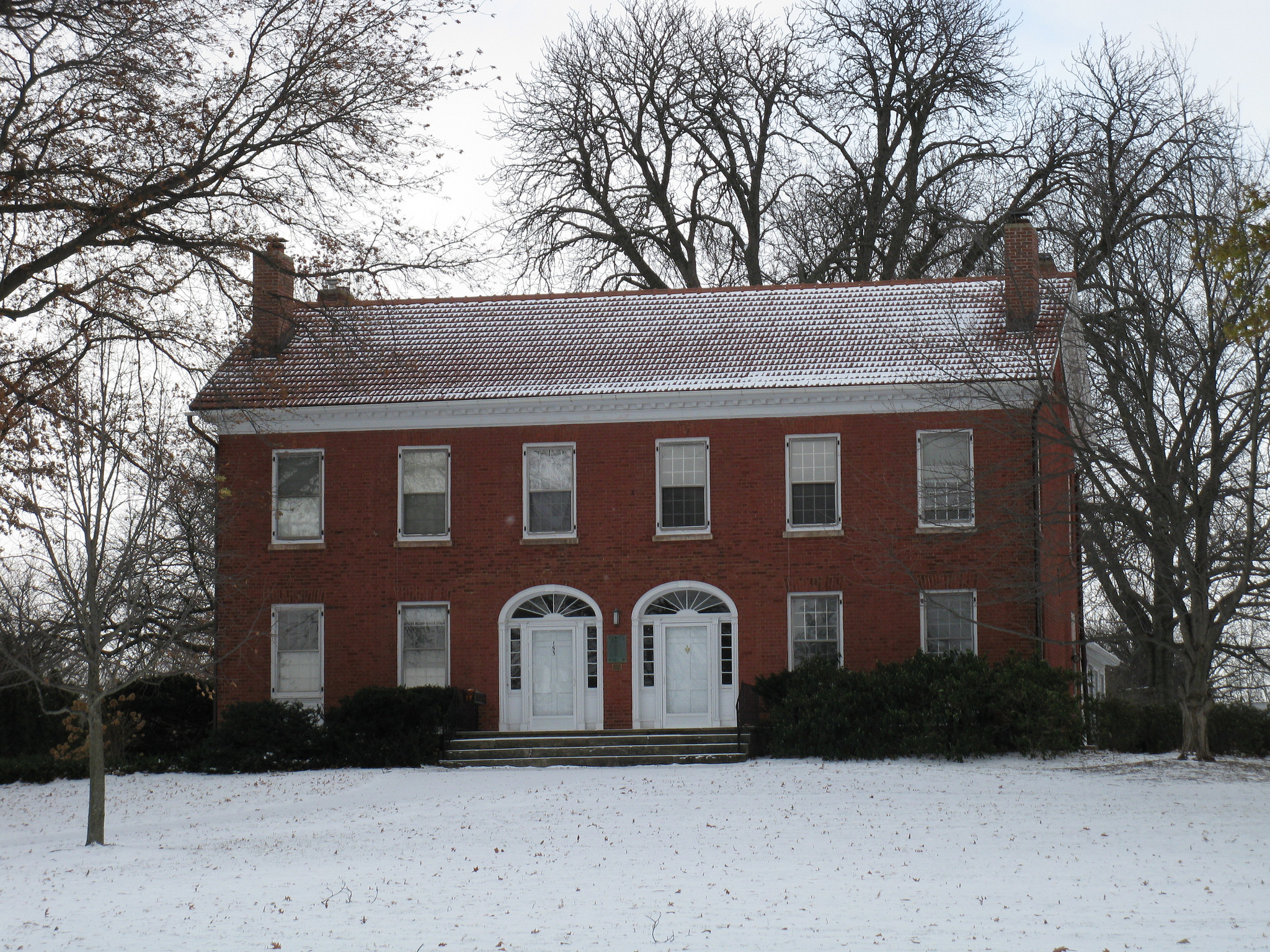 A snow-specked home in Hudson