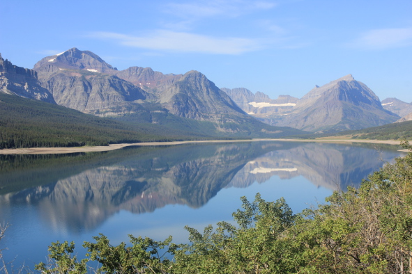 Mountains reflected in Lake Sherburne, Glacier National Park (Photo: Jeff Rindskopf)