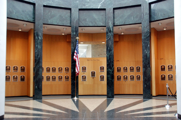 The five center plaques honor the Hall of Fame's first class of inductees in 1936: Ty Cobb, Walter Johnson, Christy Mathewson, Honus Wagner and Babe Ruth (Photo: Ron Cogswell via Flickr) 