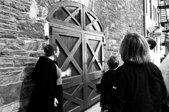 Ghost tour guide Jennifer Angstadt, left, leads visitors on a walk to some of Lancaster's reportedly haunted locations, including the old jail - site of the Conestoga Indian tribe massacre in December 1763 (Photo: Wendy Fontaine)