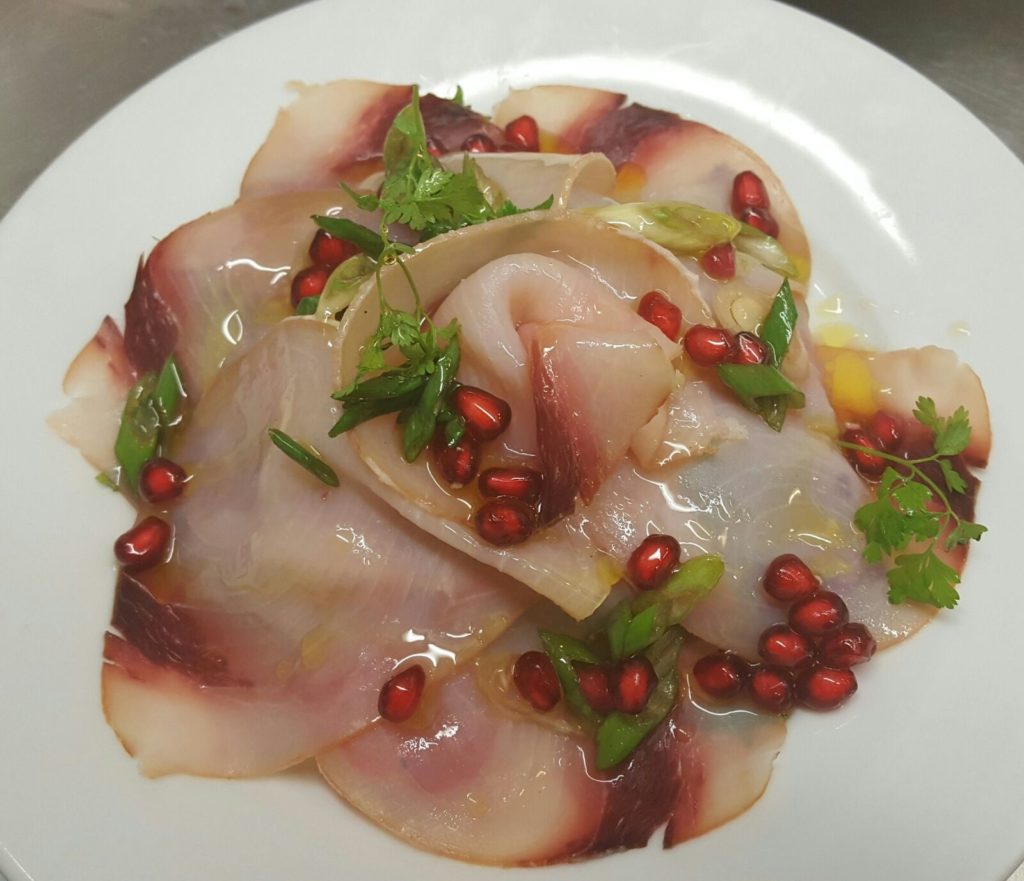 Smoked swordfish with mix salad pomegranate and spring onion dressing (Photo: Locanda Del Melo)