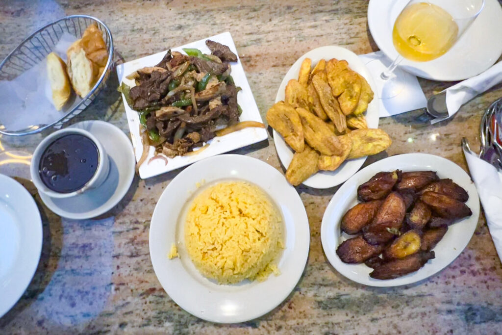 Beef and vegetables, rice, and plantains.