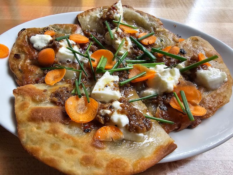 Layers Of Bacon, Lettuce, And Tomato Piled Sky-High