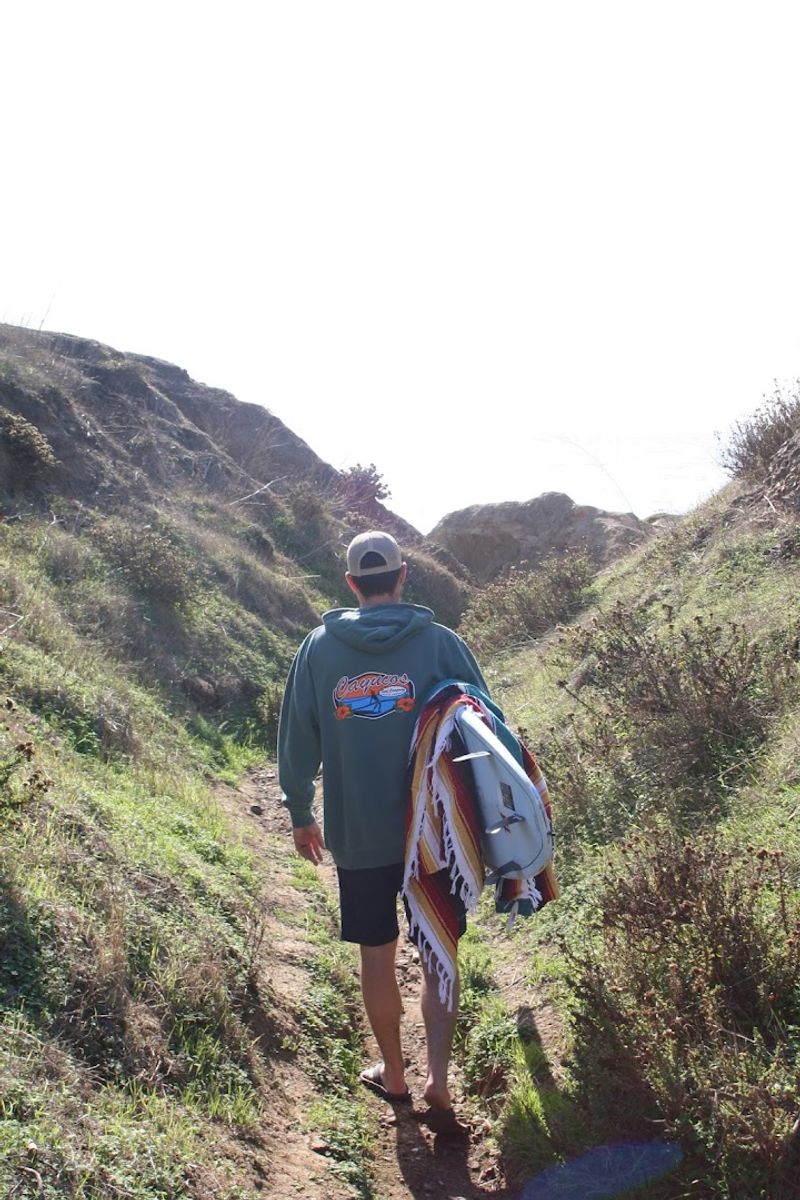Surfing And Paddleboarding At Cayucos Beach
