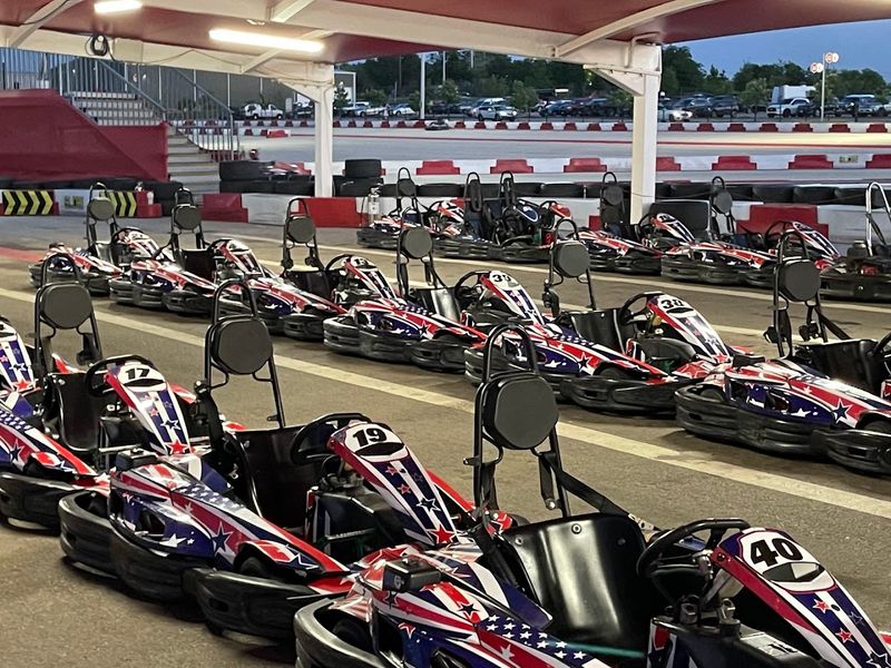 The Pit Lane Experience And Paddock Atmosphere