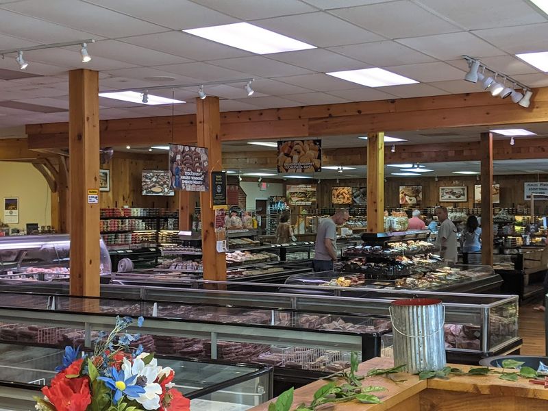 The Deli Slicing Counter Loaded With Cheese And Cold Cuts