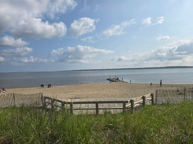 The Outdoor Picnic Bench Setting By The Water