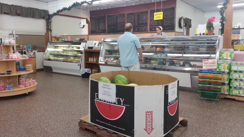The Deli Counter Loaded With Cheeses And Meats