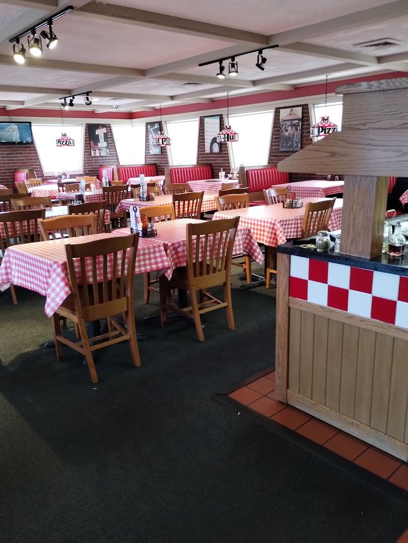 Red Vinyl Booths And Checkered Tables Still Going Strong