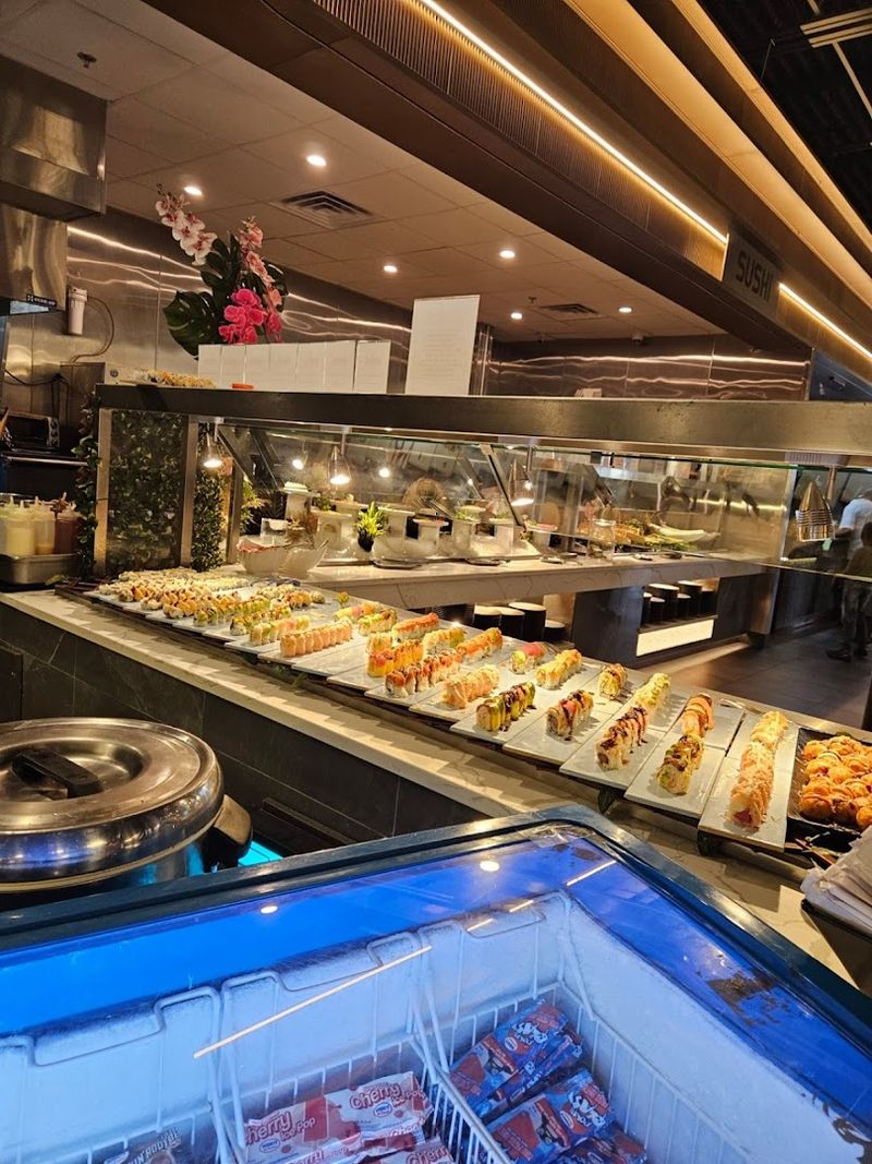 Sushi Bar With Rolls And Sashimi
