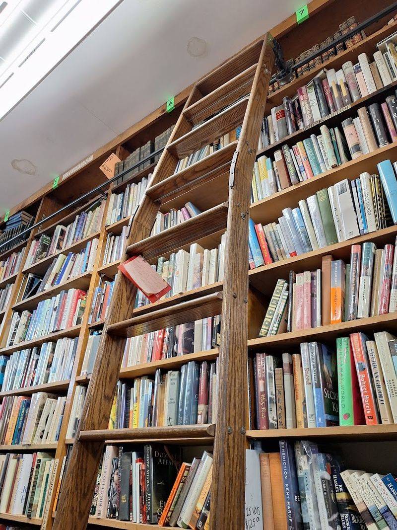 Floor-To-Ceiling Shelves And Rolling Ladders