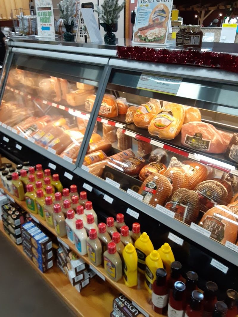 A Deli Counter Stocked With Over 150 Meats And Cheeses