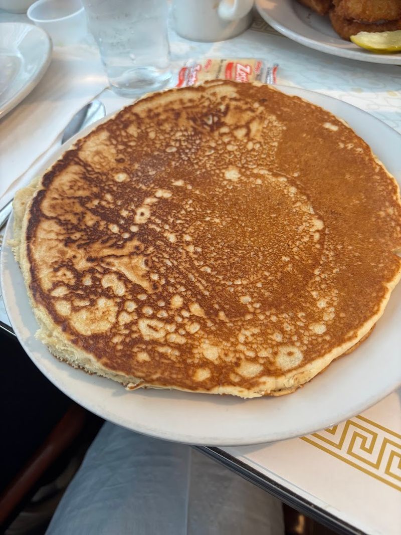 The Giant Pancakes That Practically Hang Off The Plate