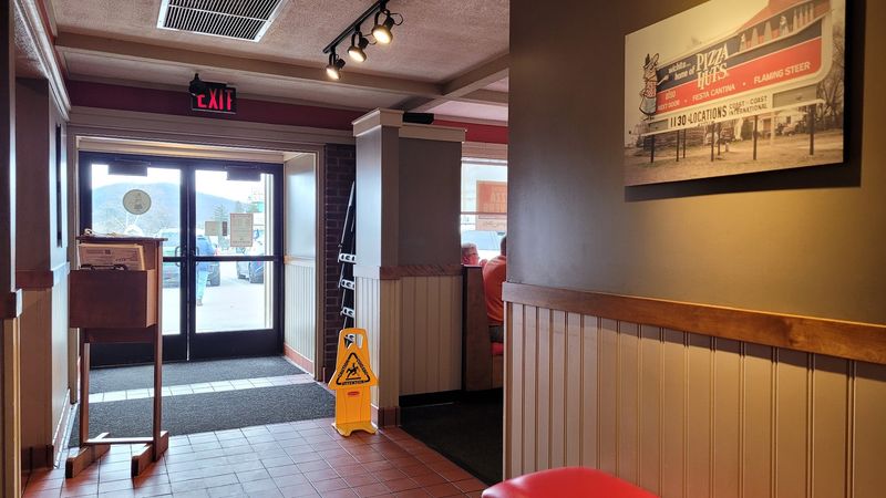 Wall Photos And Clippings That Tell Pizza Hut's Full Story