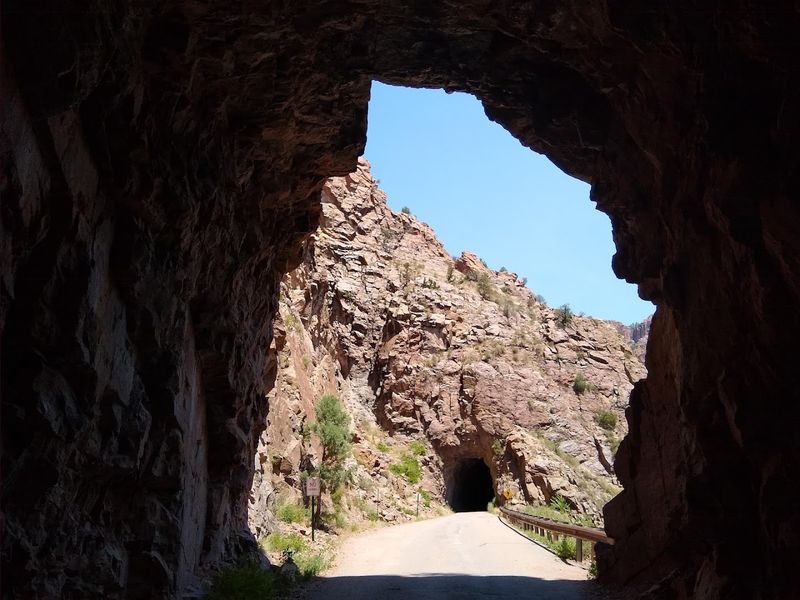 Where Dark Tunnels Frame Red Rock Views