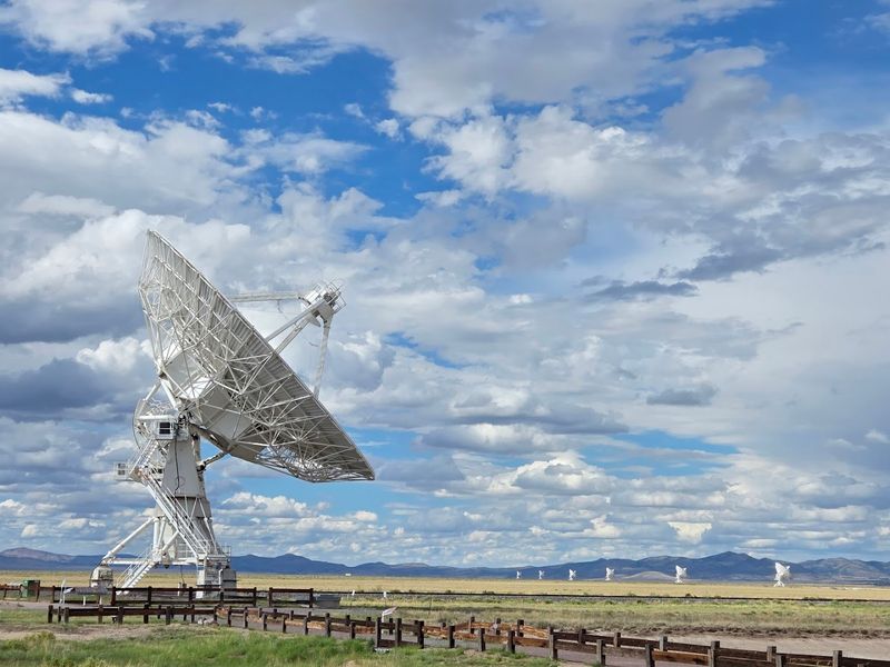 Desert Horizons Framed By Massive Telescopes
