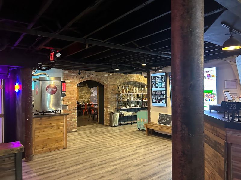 Board Games, Local Art, And A Pool Table Walk Into A Restaurant