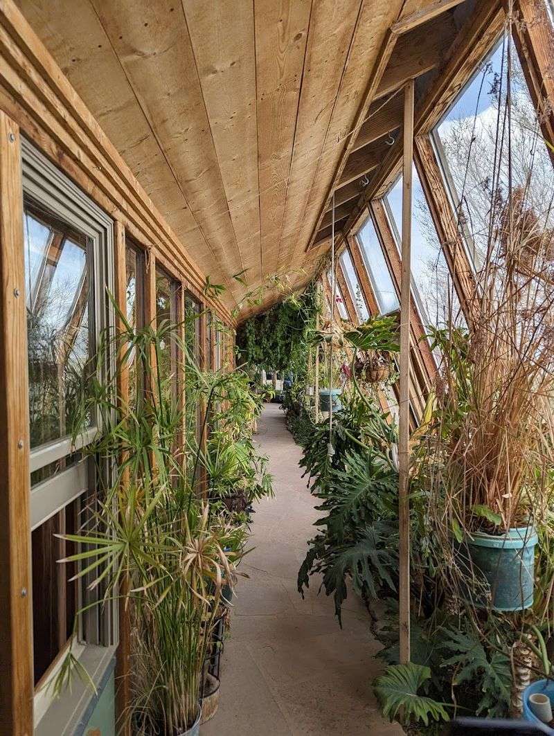 Sunlit Greenhouses Inside Earthen Walls