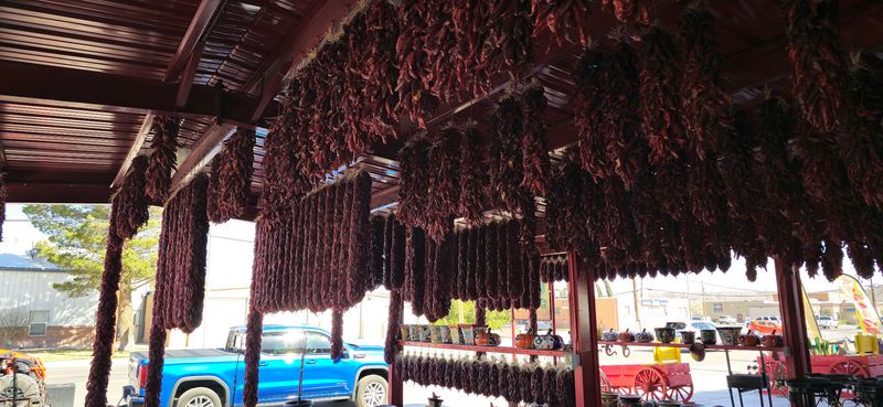 Pepper Roasters Turn Beside Open-Air Markets