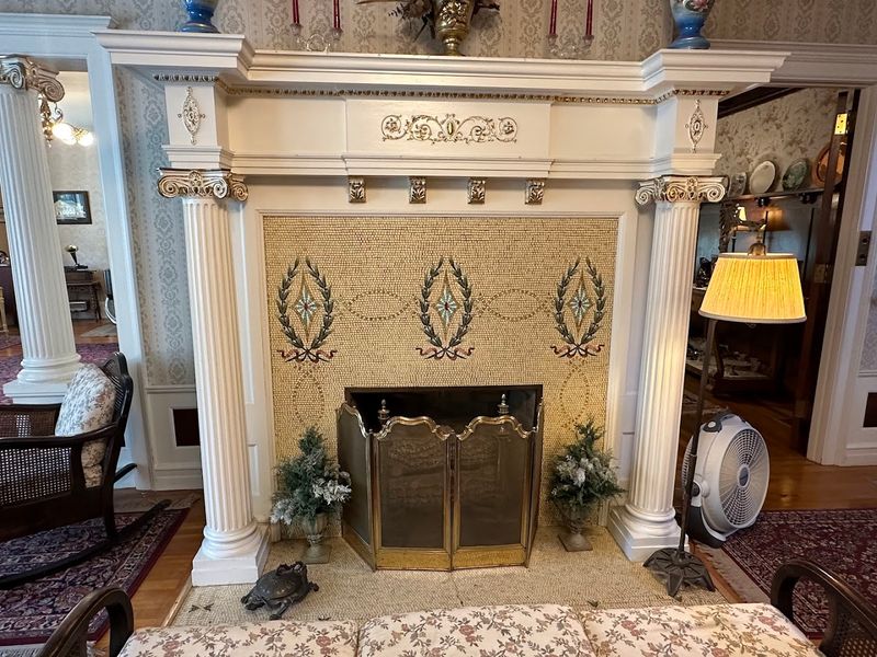 A Tiffany Mosaic Surrounds One Of The Fireplaces