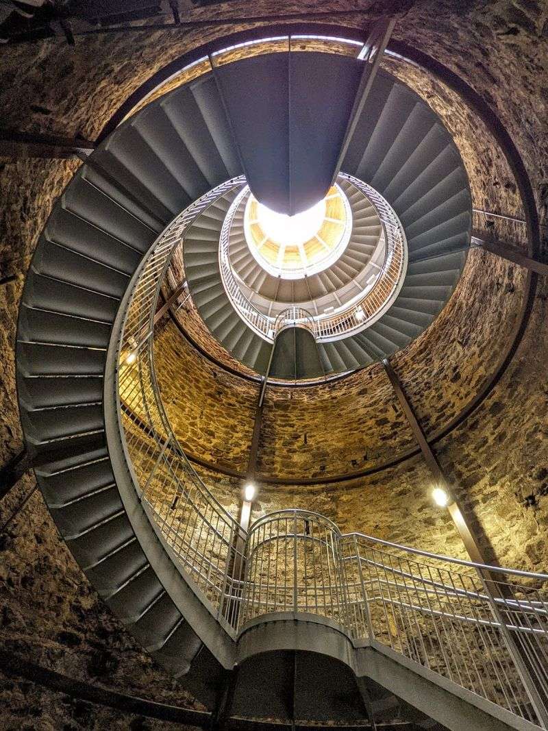 A Cantilevered Spiral Staircase Lets You Descend Into The Well