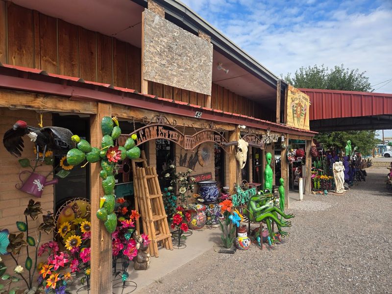 Ristras Hang Bright Against Desert Storefronts