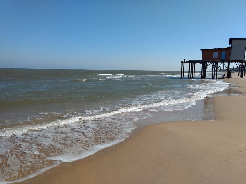 Surfing On A Quiet Texas Shore