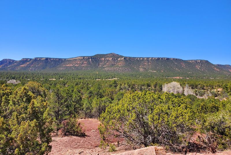 Red Earth Views And Mountain Air