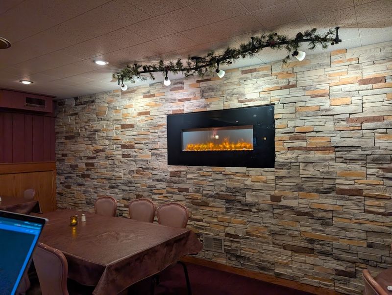 Wood Paneling And Stone Fireplaces Set The Mood