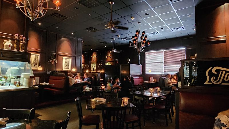 Dark Wood, Warm Light, and a Room That Means Business