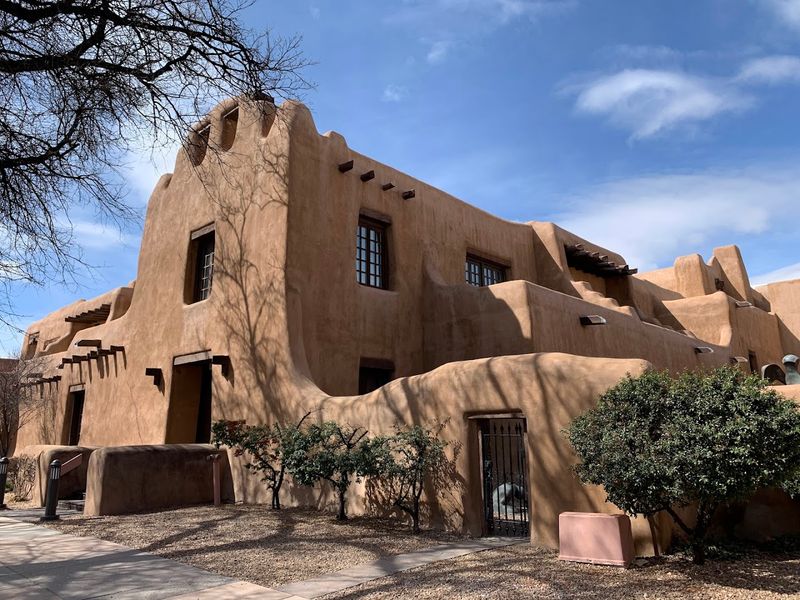 Adobe Walls And Sunlit Courtyards