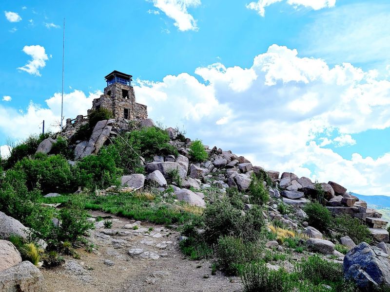 A Stone Tower Above The Pines