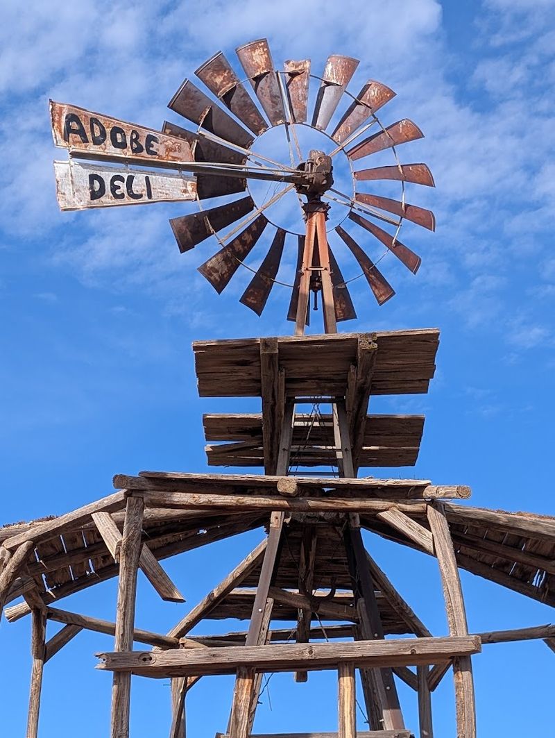 Desert Road Arrival With Old West Character