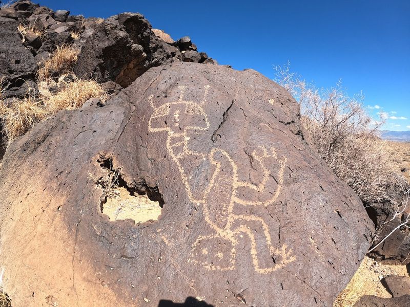 Ancient Symbols Across Desert Stone