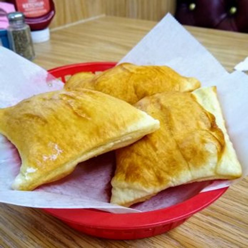 Warm Sopapillas Served With Honey