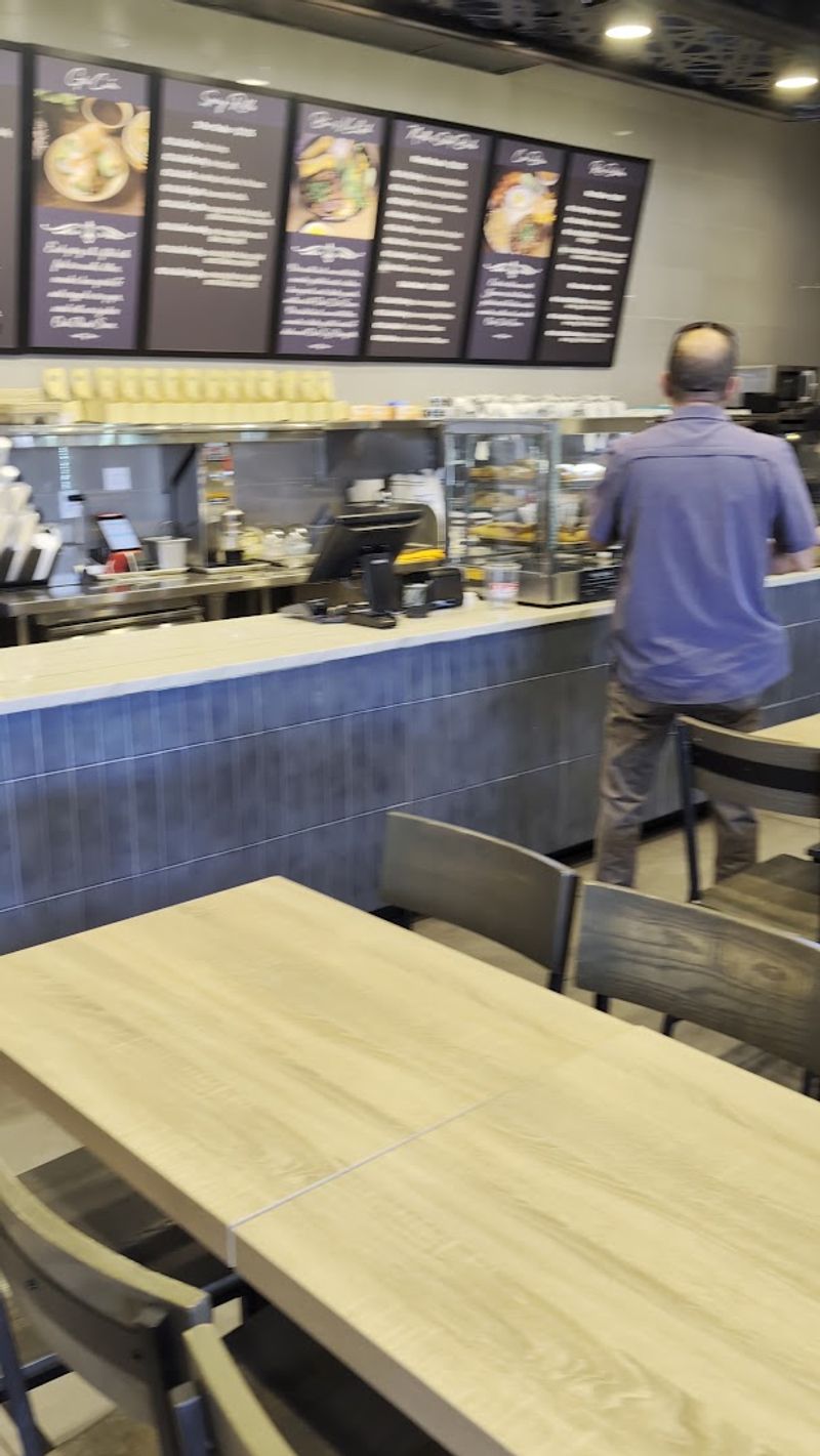 Simple Seating With A Busy Bakery Rhythm