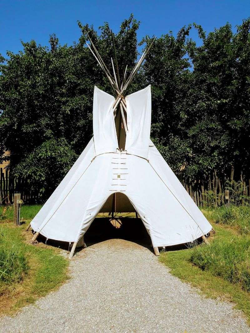 The Full-Sized Tipi Inside And Outside The Building