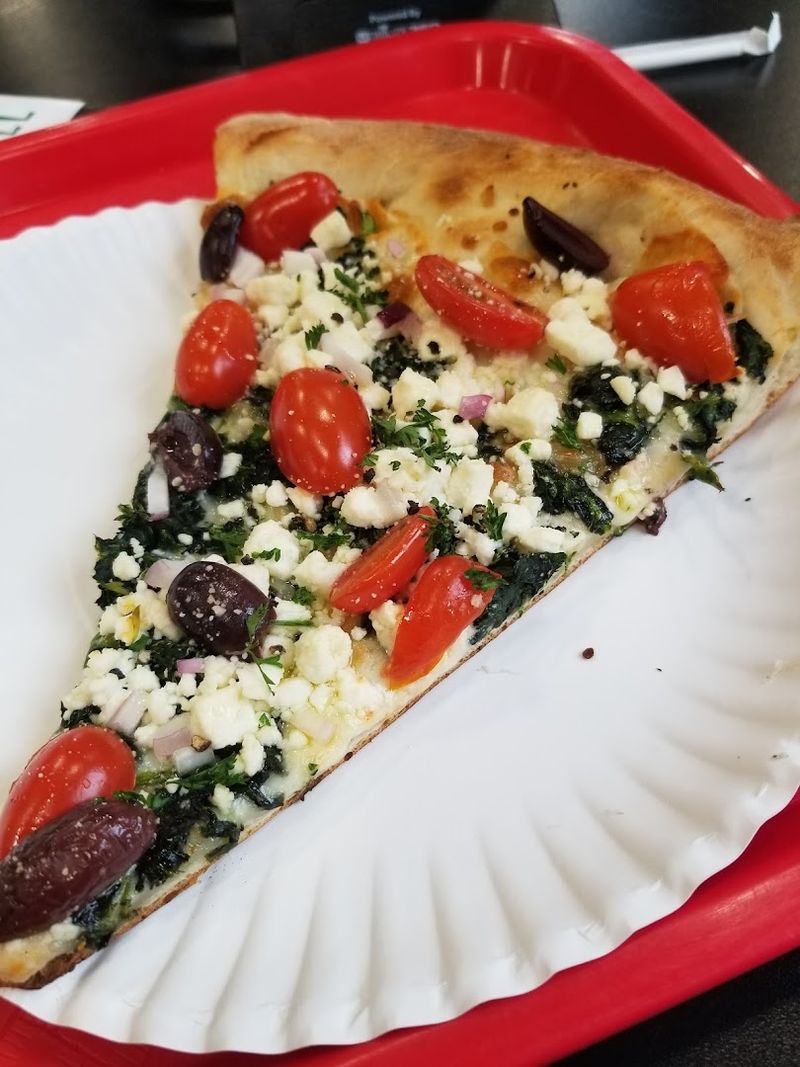 New York-Style Slices Share Space With The Main Character