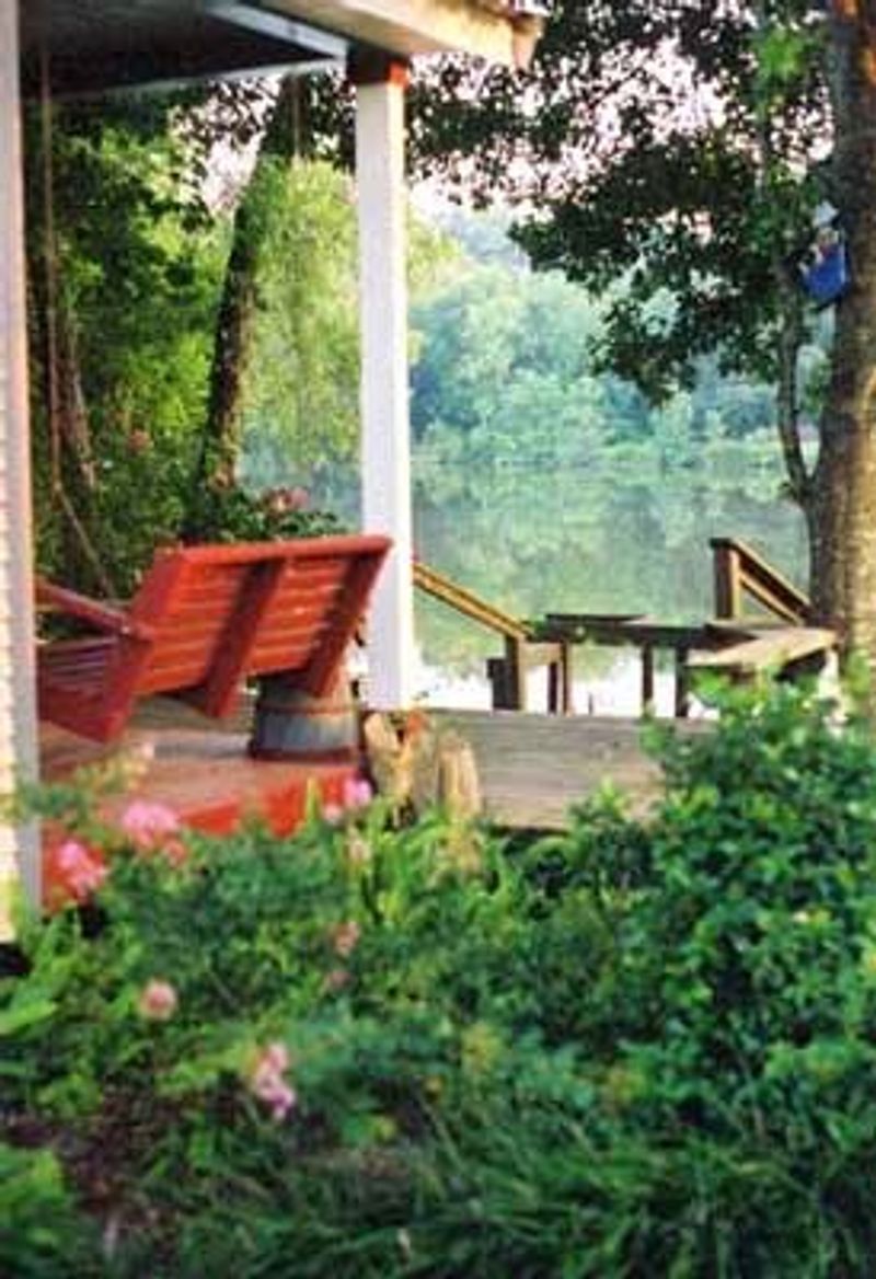 Relaxing On A Private Porch Swing