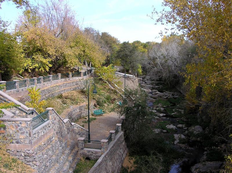 A Creek Beneath Historic Storefronts