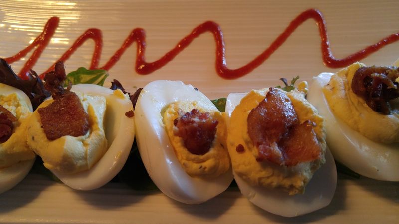 Deviled Eggs With Candied Bacon And Capers