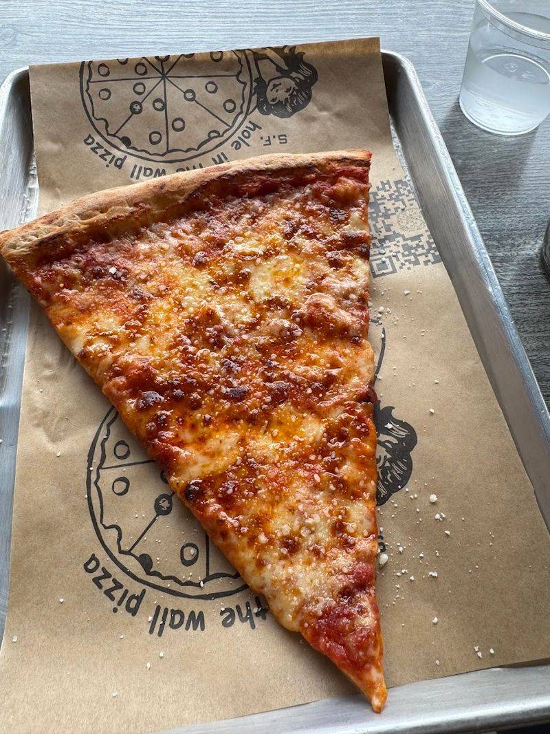Slices So Big They Barely Fit The Plate