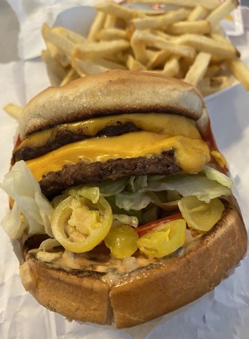 The Double-Double With Chopped Chilies And Whole Grilled Onion