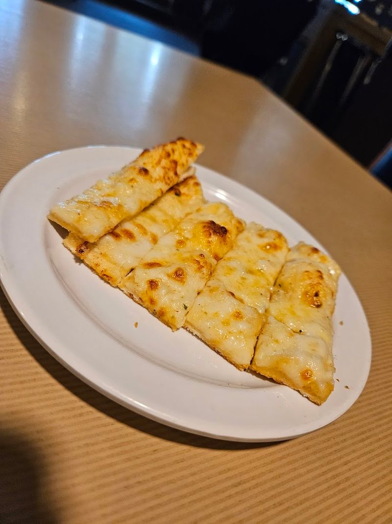 Garlic Cheese Bread That Arrives Before You Even Ask